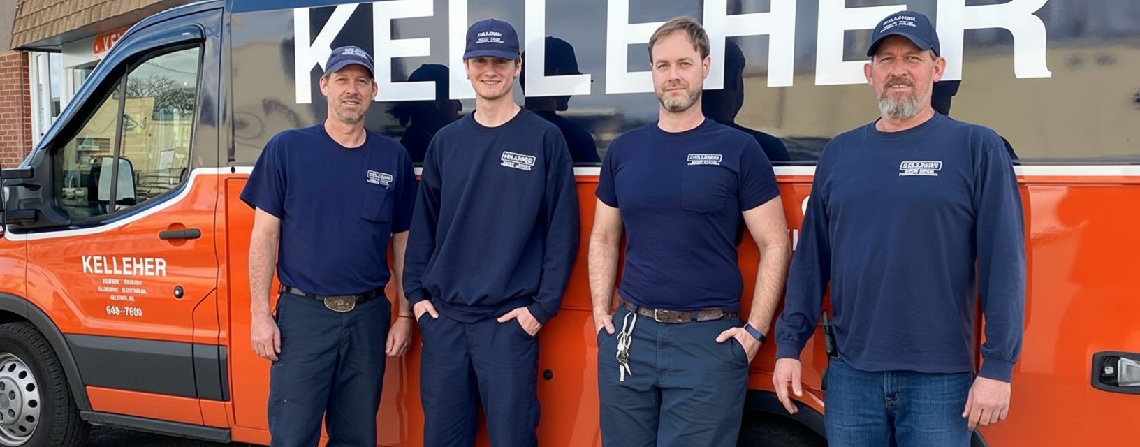The Kelleher installation team beside their van