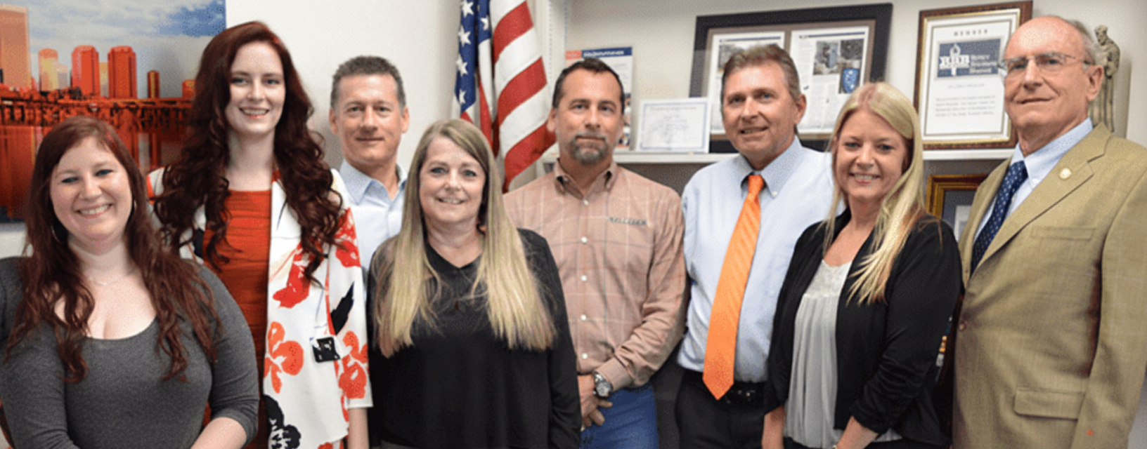 Members of the Kelleher family and office team together in the office